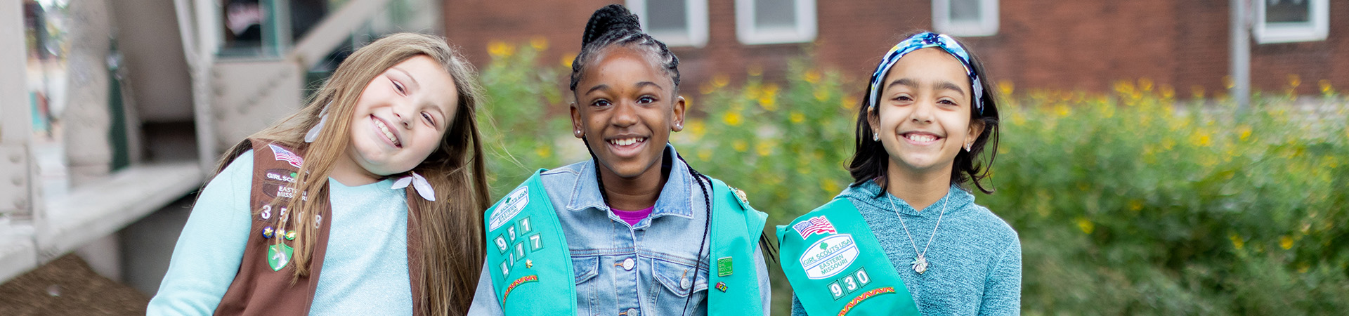  group of girl scouts smiling 