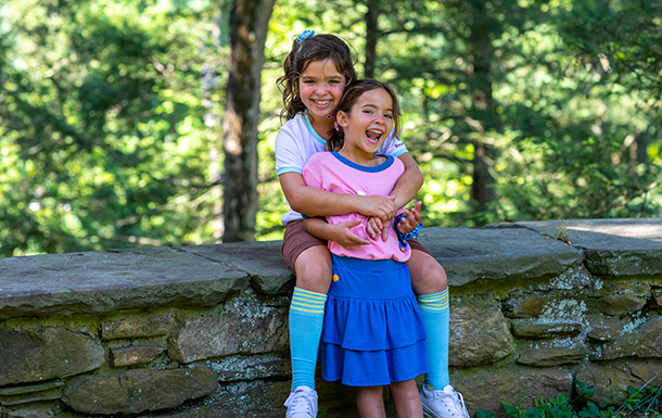 two girls playing outside